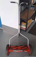Full view of mower front showing brand and design