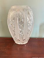 Front view of clear lead cut crystal vase displaying cut pattern and overall form