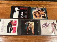 All five soundtrack CDs displayed front covers visible