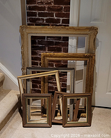 All seven frames stacked showing sizes and finishes