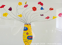 Close-up of floral artwork in vase