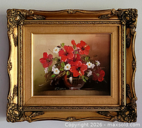 Frontal view of framed floral painting