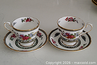 Two Paragon cups with saucers showing pattern and overall condition