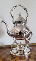 kettle assembled on stand with burner visible