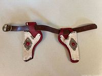 full view of belt with both holsters