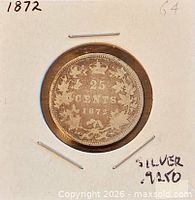 Reverse of 1872 Canadian 25-cent coin in holder