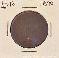 Obverse in flip showing date 1890 and grade F-12
