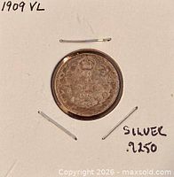 Reverse view highlighting wreath, crown and date