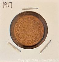 Reverse of 1917 Canada one-cent coin showing denomination, date, decorative border