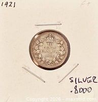 Coin reverse: denomination, maple-leaf wreath, date 1921