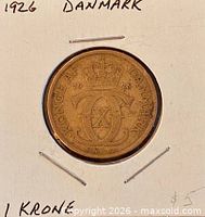 Obverse view in holder showing crowned Christian X monogram and date