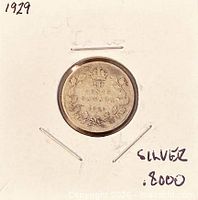Coin reverse showing 10 CENTS CANADA 1929 within maple wreath