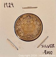 Reverse side showing date 1929, denomination 25 cents, wreath and crown