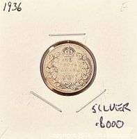1936 Canada 10 cents coin in cardboard flip, reverse side visible