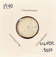 Reverse showing Bluenose schooner with date 1940