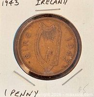 Obverse view showing harp design and 1943 date within cardboard holder
