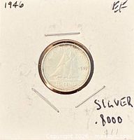Coin in 2x2 holder with handwritten notes