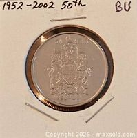 Reverse of 2002 Canada 50 cent commemorative coin in holder