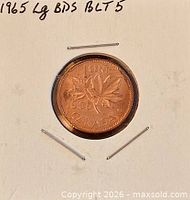 Reverse showing 1965 date and maple leaves