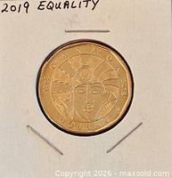 Reverse of 2019 Equality loonie in holder