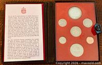 Closed case open showing bilingual information card and coin tray