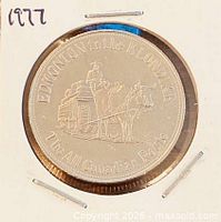 Obverse showing ox team and text Edmonton to the Klondike