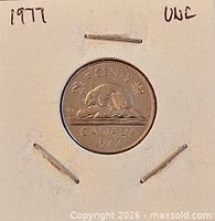 Reverse side showing beaver design, denomination and year