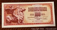 Obverse of 100 Dinara banknote showing horseman design