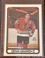 Front of Denis Savard O-Pee-Chee card showing player image and team info