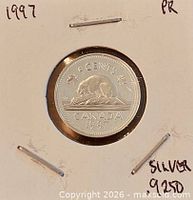 Coin in holder, full view with annotations