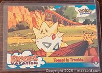 Front of Topps Pokémon card featuring Togepi and Pikachu