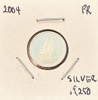 Full holder showing obverse side in 2x2 flip with year and silver content noted