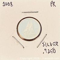 Coin in 2×2 holder with notations .925 silver and 2008 PR