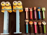Front view of all PEZ dispensers showing characters and size comparison