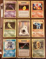 Front view of nine sleeved Pokémon cards