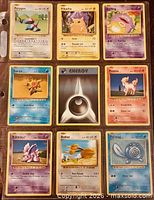Front view of all nine cards in a binder sleeve