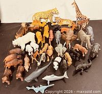 Group shot showing entire assortment of wildlife figurines