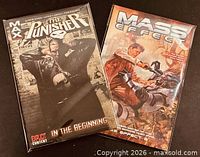Front covers of both bagged trade paperbacks