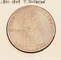 Obverse of medal showing portrait, inscriptions and Chinese characters