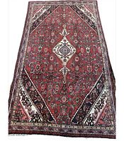 Full view of entire Hamadan rug showing red field and medallion