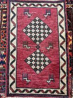 Full view of rug showing entire design and overall condition