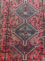 Close-up of central double medallions and field motifs