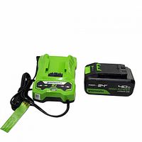 Greenworks charger and 24V 4.0Ah battery side by side
