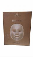 Retail box front showing LightAura LED Face Mask branding