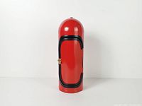Front view of closed red cylindrical metal storage container
