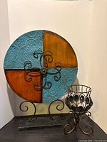 Front view of quadrant metal art and candleholder