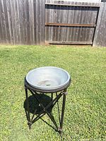 assembled plant stand with bowl outdoors