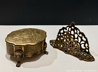 Overview of both brass items side by side