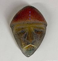 Front view of textured multicolour glass mask