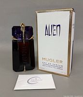 Bottle, box, and card front view